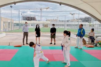 Lezioni all'aperto di capoeira, yoga, ginnastica, atletica e judo